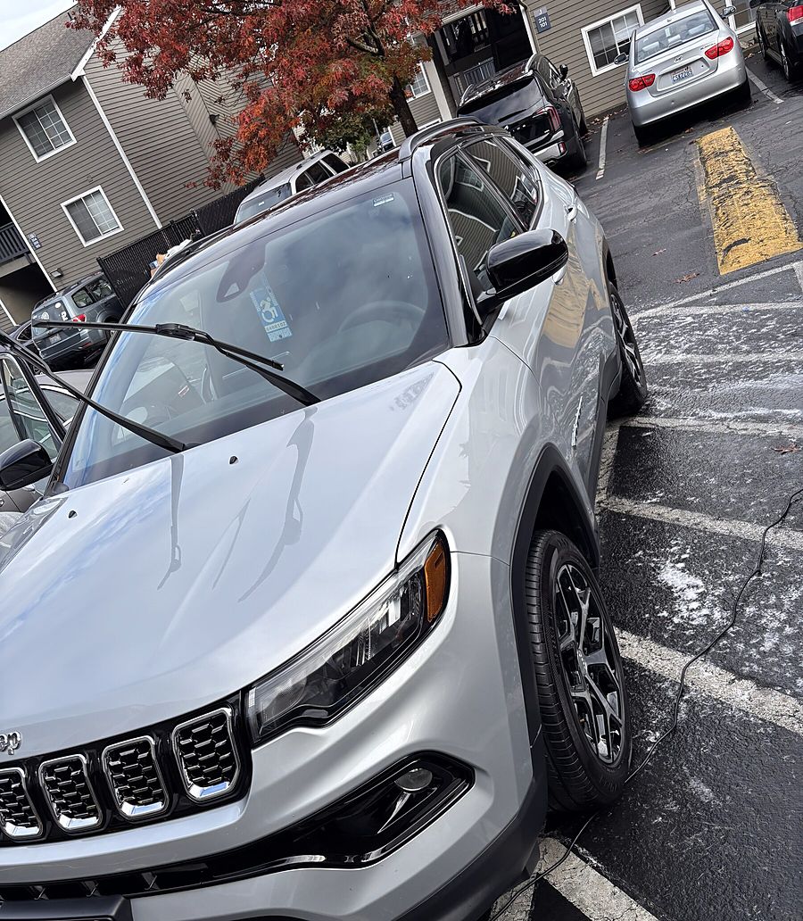 Silver Jeep after an exterior wash